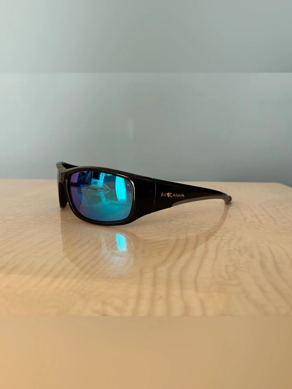 Piranha Men's Black Sunglasses with Blue Mirrored Lenses